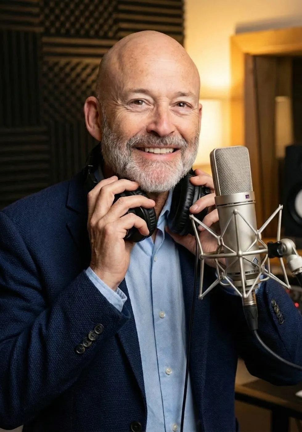 Dana P. Rowe in his recording booth